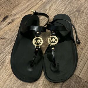 9, Michael Kors black and gold sandals